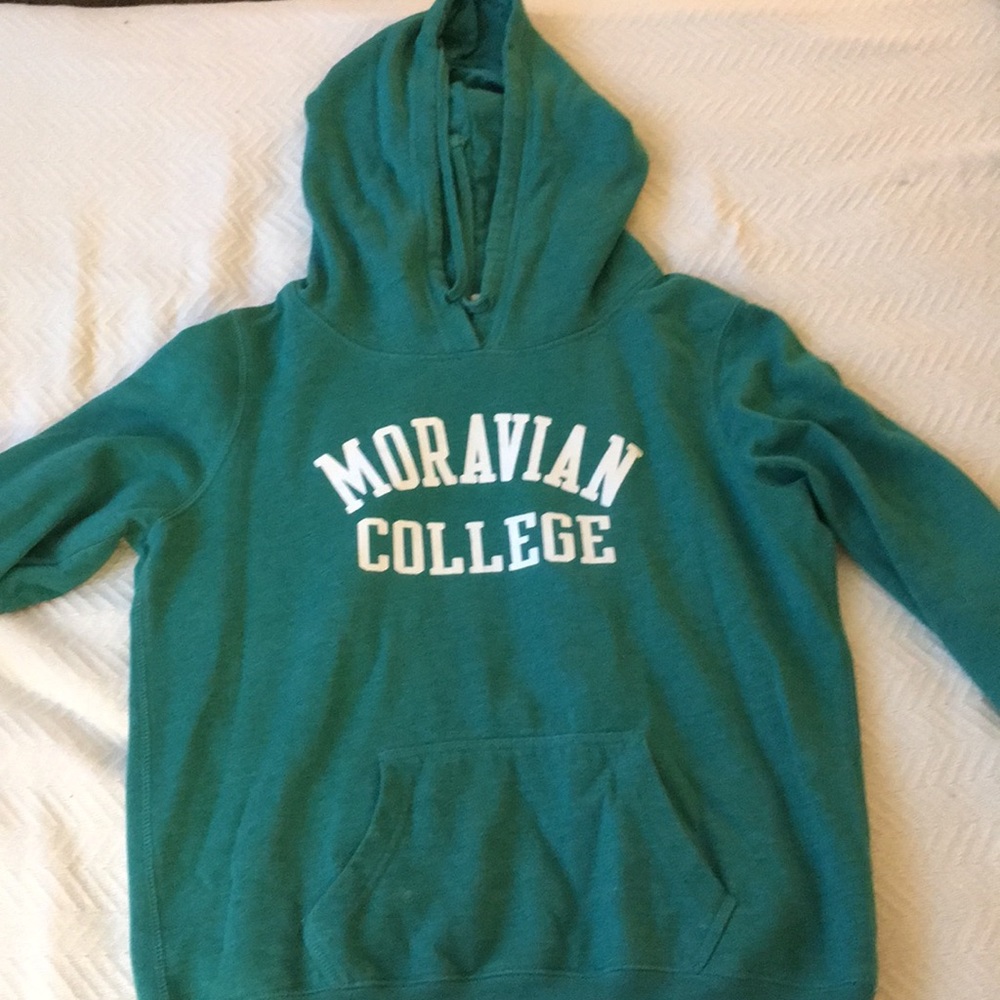 Moravian College green hooded sweatshirt.